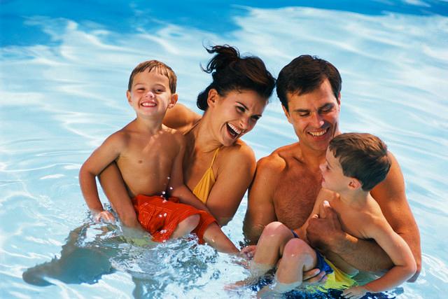 Family Playing in Pool